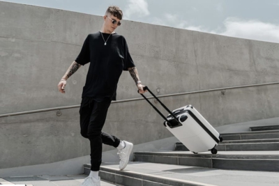 July's Crush-Proof Carry On Case Charges Your Phone and Laptop