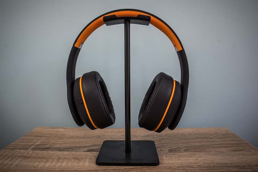 Orange Crest Headphones in stand